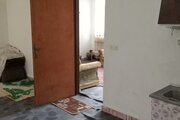 کلبه تکخواب علاءالدین در توتکابن | آشپزخانه به پذیرایی
