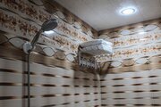 اتاق 1فرش در طبقه اول اقامتگاه بومگردی نطنز | حوله و حمام اتاق فرش