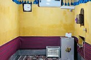 اتاق بابشاد سیرافی در اقامتگاه بومگردی کنگان