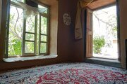 اتاق در اقامتگاه بومگردی در اسفراین