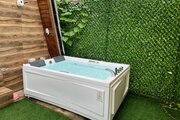 کلبه سوئیسی چوبی تکخواب جکوزی دارحسام در لاهیجان