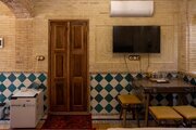 اتاق نیلوفر در اقامتگاه بومگردی شیراز