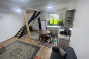 کلبه سوئیسی تکخواب جکوزی دار آیهان در ماسال | نمای پذیرایی کلبه