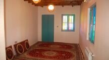 اتاق در اقامتگاه بومگردی در گیلان