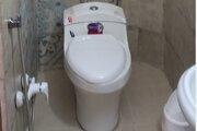 اتاق فیروزه در اقامتگاه بومگردی کرمان