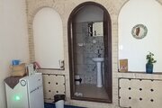 اتاق فیروزه در اقامتگاه بومگردی کرمان
