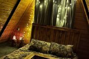 کلبه سوئیسی دوبلکس تکخواب چوبین سبز در نشتارود