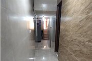 اتاق 103 سه تخت در مسافرخانه قم