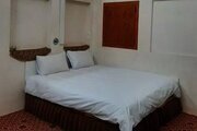اتاق سنتی دوتخته دالو در بوم گردی کاشان