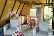 کلبه سوئیسی دوبلکس تکخواب چوبین سبز در نشتارود