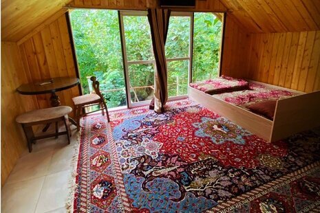 کلبه چوبی در شیرگاه