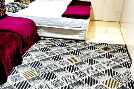 اتاق چهار تخت 1 در مهمانپذیر مشهد