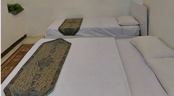 اتاق دو تخته شمعدونی اقامتگاه بوم گردی در اصفهان