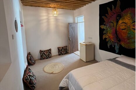 اتاق یک تخت دبل غروب در بومگردی طبل