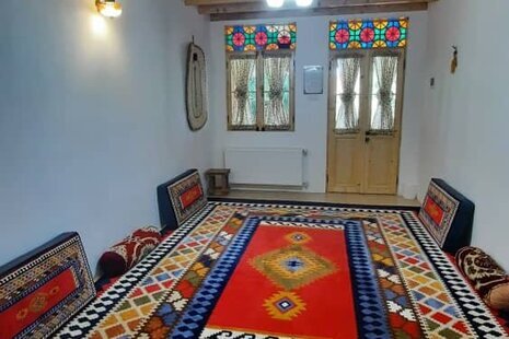 اتاق نازگل در اقامتگاه بومگردی خمام