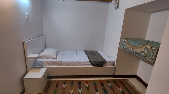 اتاق یک تخته در اقامتگاه بومگردی در اصفهان