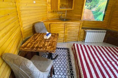 سوئیت چوبی آفتابگرادان در مجموعه اقامتی خمام