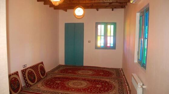 اتاق در اقامتگاه بومگردی در گیلان