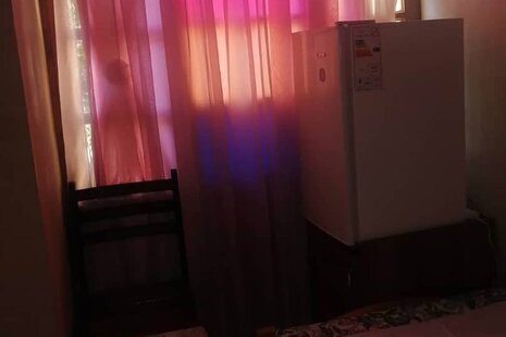 اتاق تک نفره نارنج در اقامتگاه بومگردی شیراز