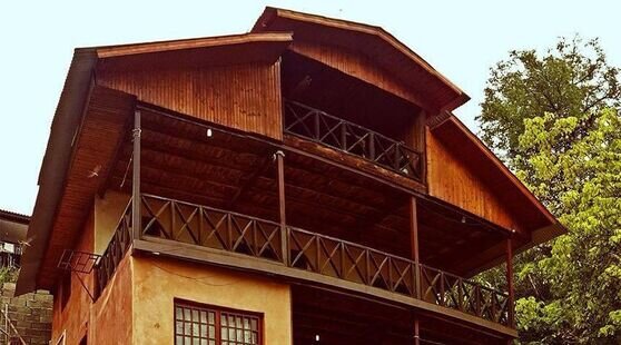 کلبه چوبی دوبلکس نیسا در روستای پاقلعه