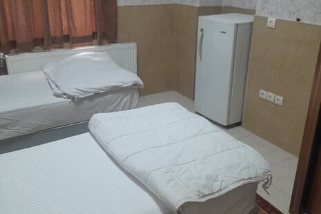 اتاق 103 دو تخت در مسافرخانه میدان خراسان