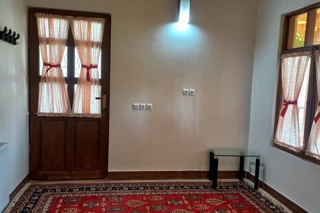 سوئیت نارنج در اقامتگاه بومگردی شیرگاه