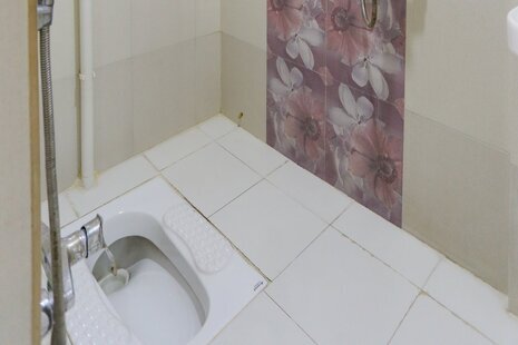 اتاق سه نفره با سرویس ایرانی کاناپه دار در هتل میدان راه آهن تهران