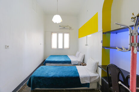 اتاق سه نفره مستردار در هاستل در دروازه دولت