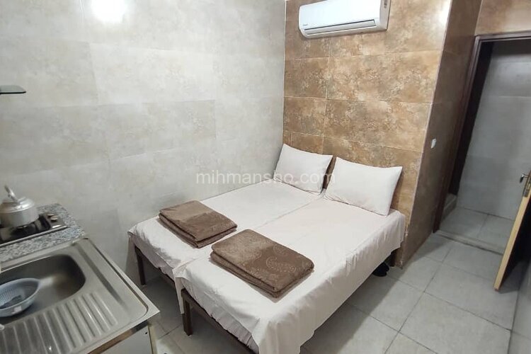 اتاق 402 دو تخت در مسافرخانه قم