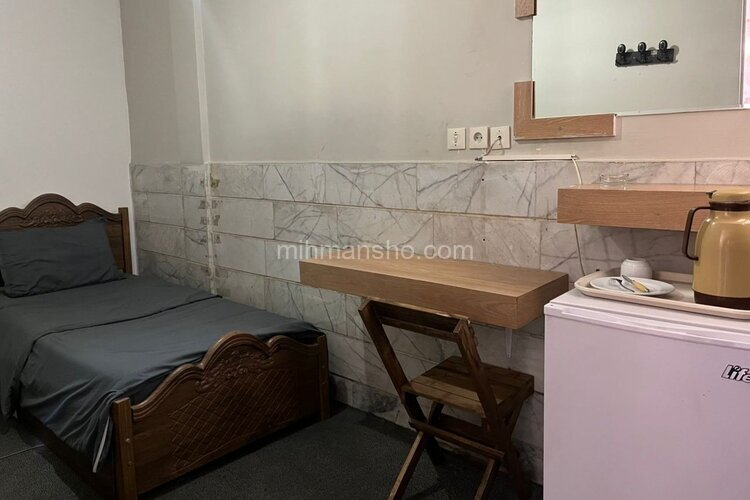 اتاق تک تخت در هتل شهریار