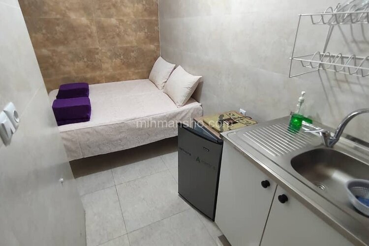 اتاق 203 دو تخت در مسافرخانه قم