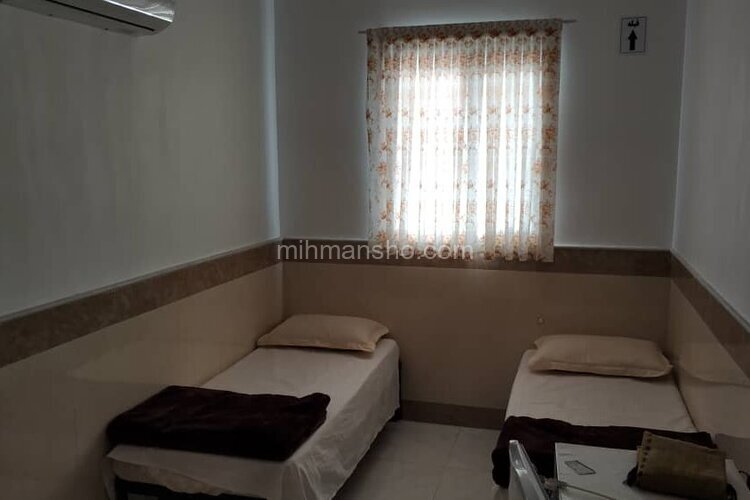 اتاق 302 دو تخت در مسافرخانه قم