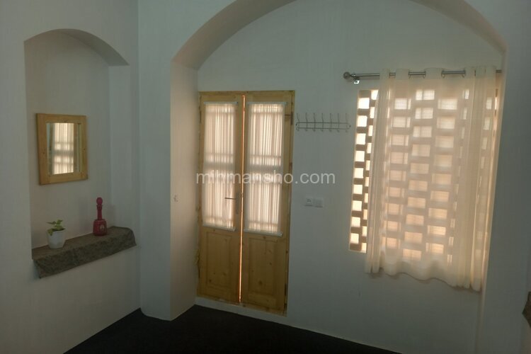 اتاق نورسته در اقامتگاه بومگردی کاشان