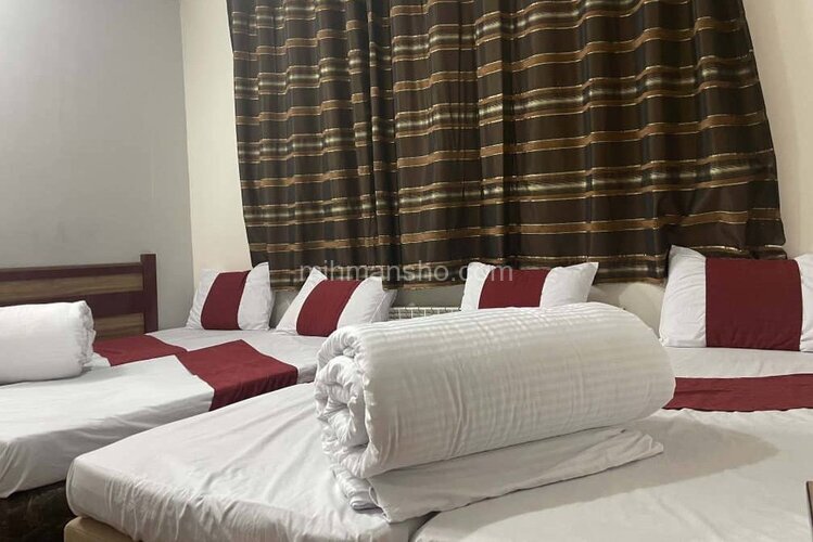 اتاق چهار تخت 201 در هتل مشهد