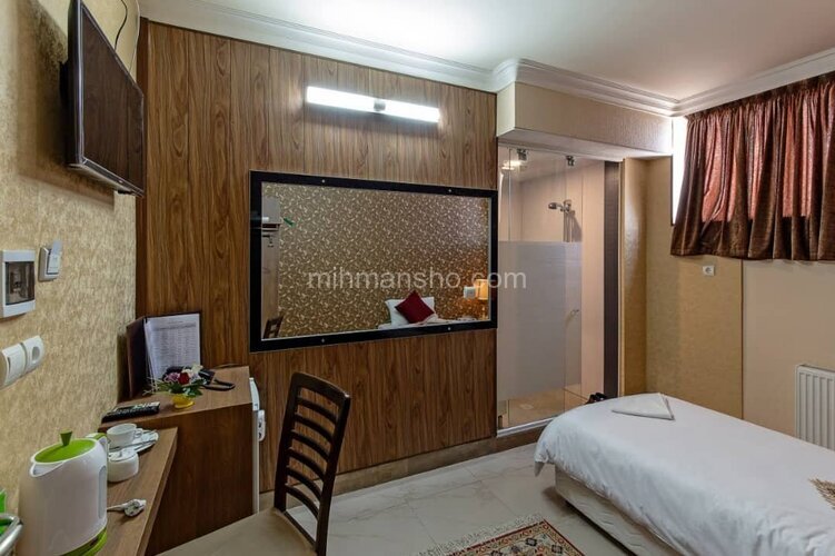 اتاق یک تخت در هتل آپارتمان اصفهان